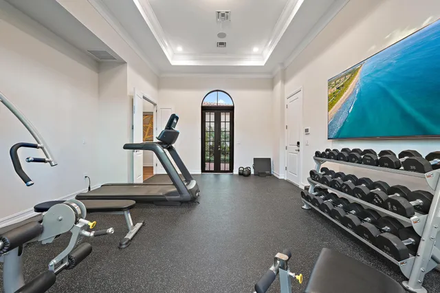 a view of a house with a garden and a yard