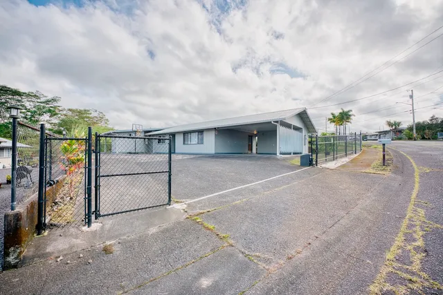front view of a house with a street
