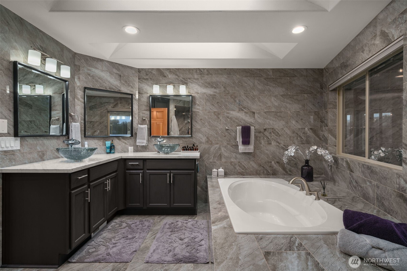 7909 Fern Glen Road Lake Stevens, WA 98258 - Photo 20 of 40 a bathroom with a sink and a mirror