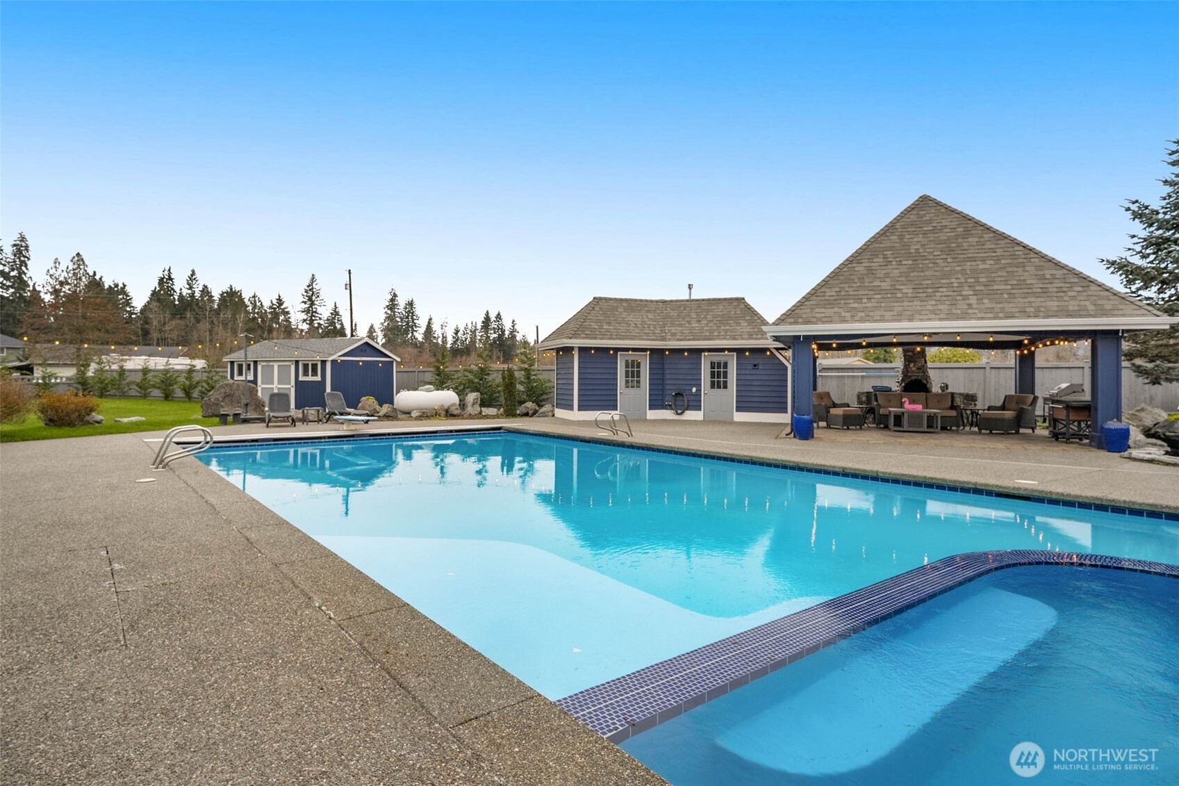 7909 Fern Glen Road Lake Stevens, WA 98258 - Photo 2 of 40 a view of a house with pool