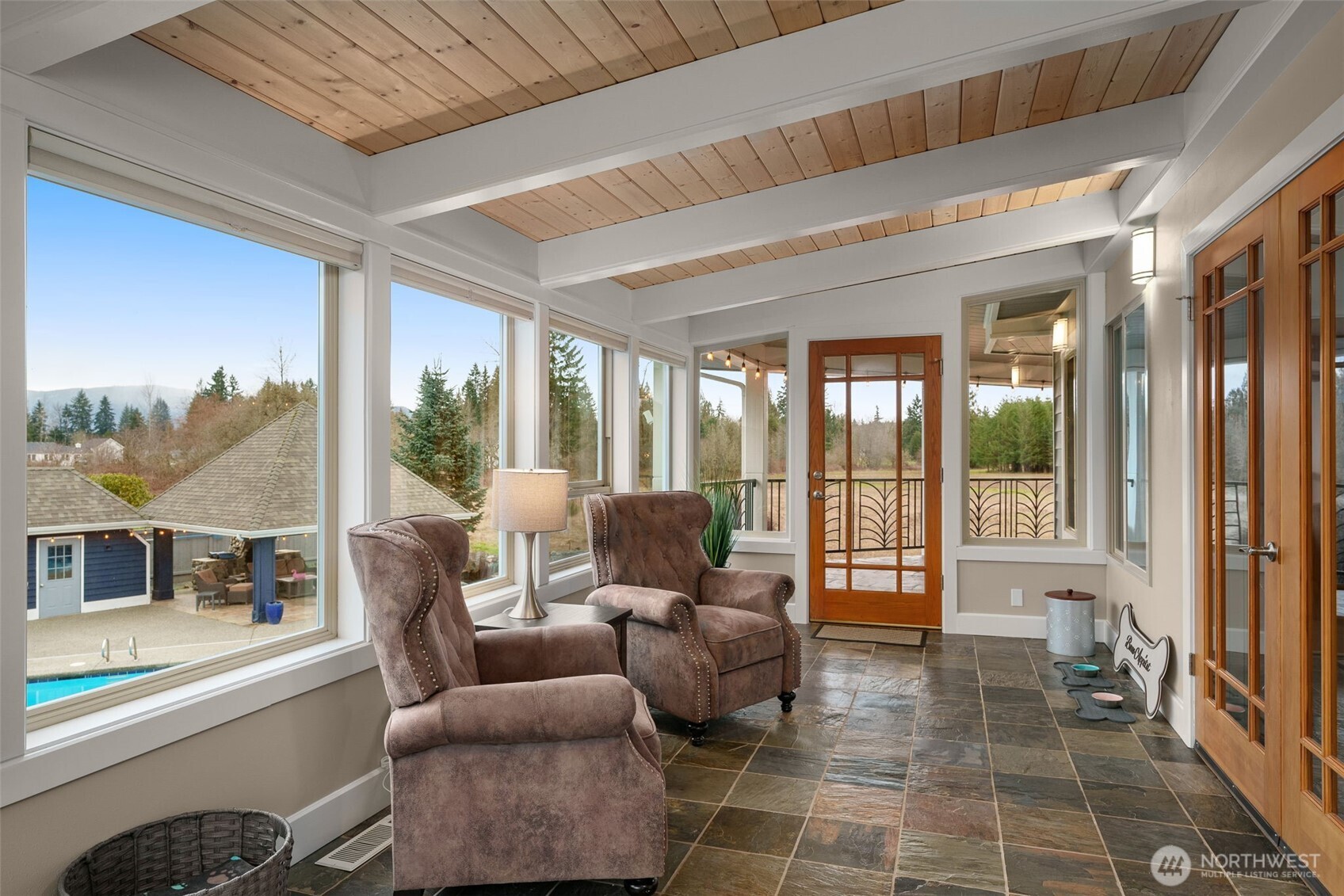 7909 Fern Glen Road Lake Stevens, WA 98258 - Photo 21 of 40 a living room with furniture and large windows