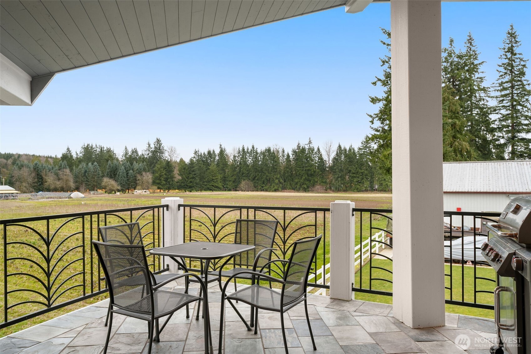 7909 Fern Glen Road Lake Stevens, WA 98258 - Photo 31 of 40 a view of a balcony with chairs