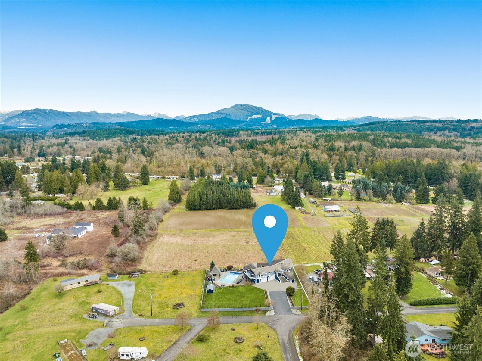 7909 Fern Glen Road Lake Stevens, WA 98258 - Photo 40 of 40 a view of a lake with a mountain