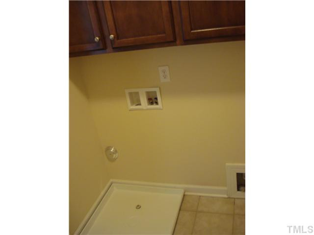 2225 Dunlin Lane Raleigh, NC 27614 - Photo 24 of 24 Laundry room with storage and lots of space with a clothes rack in the laundry room (not visible here) Laundry Room