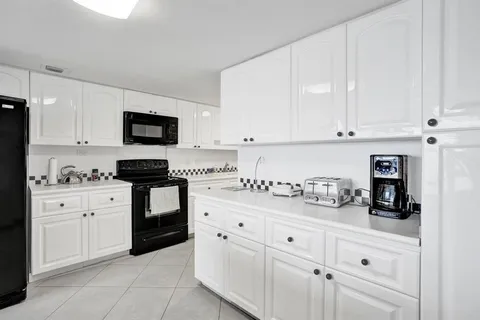 a view of a dining room and furniture