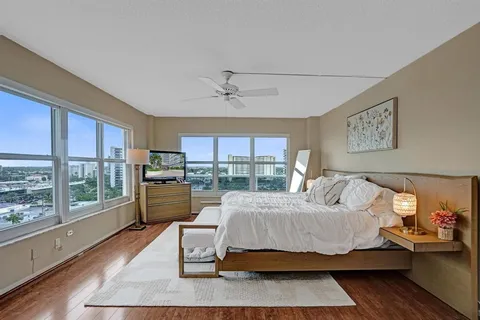 a bedroom with a bed and furniture