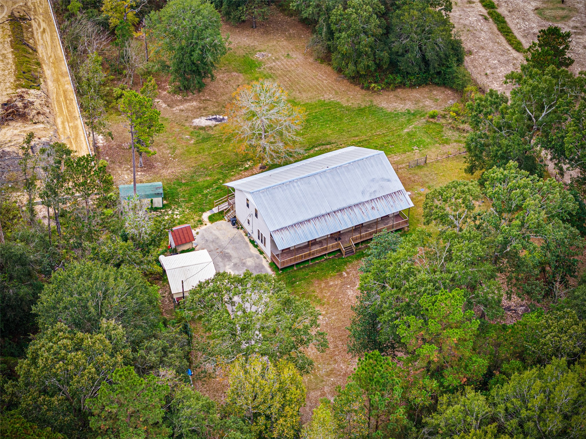 7 Northwood Country Road Huffman, TX 77336 - Photo 45 of 50 an aerial view of a house with a yard