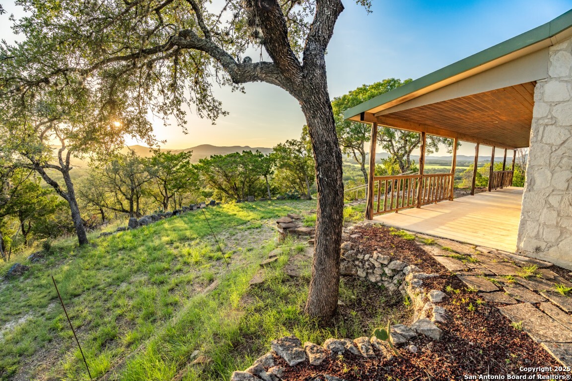 599 Mountain View Road Utopia, TX 78884 - Photo 37 of 38 a view of a yard with an outdoor space