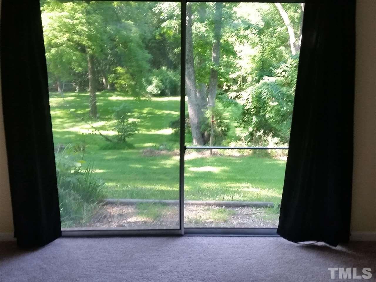 219 Latta Road Durham, NC 27712 - Photo 11 of 15 Backyard view from Family Room
