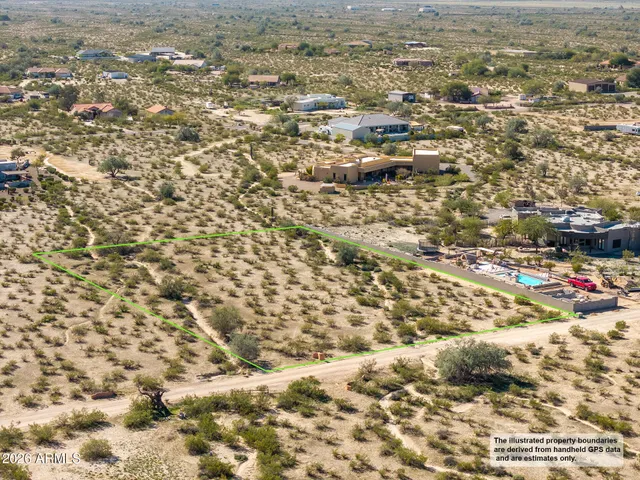 a view of an ocean with a mountain