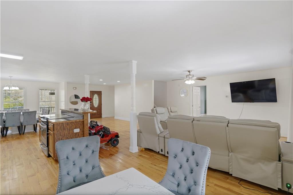 262 Iron Hill Road Taylorsville, GA 30178 - Photo 13 of 38 a living room with furniture and a flat screen tv