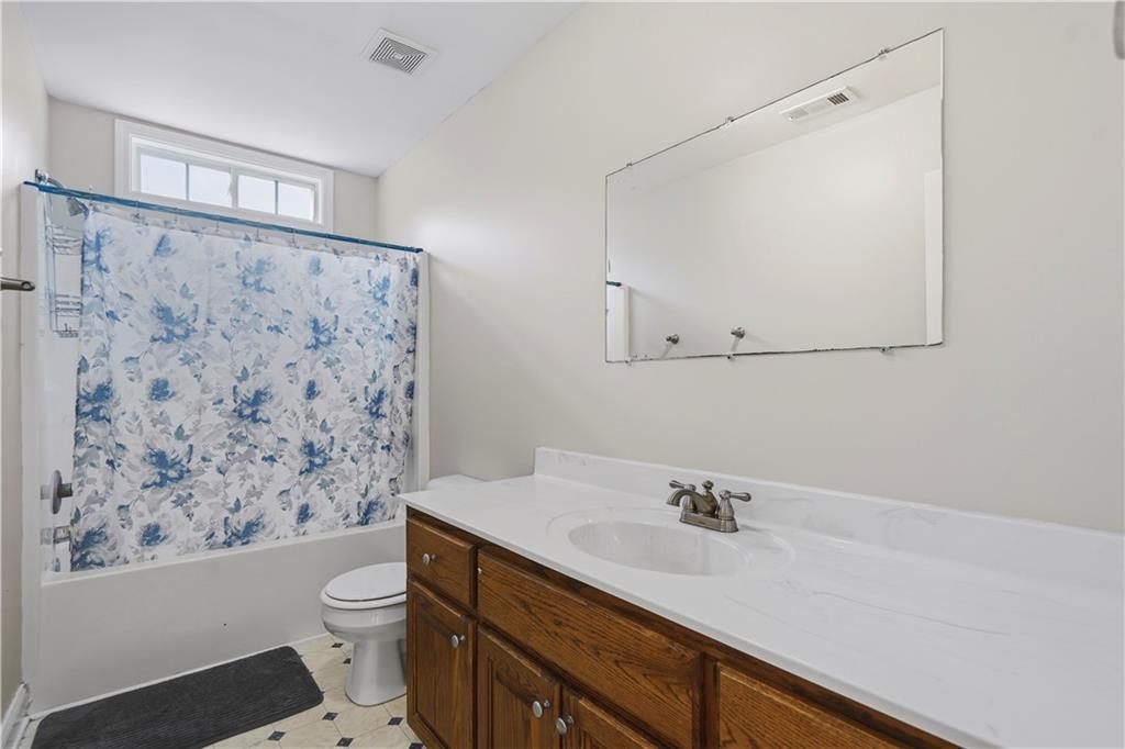 262 Iron Hill Road Taylorsville, GA 30178 - Photo 20 of 38 a bathroom with a sink toilet and shower