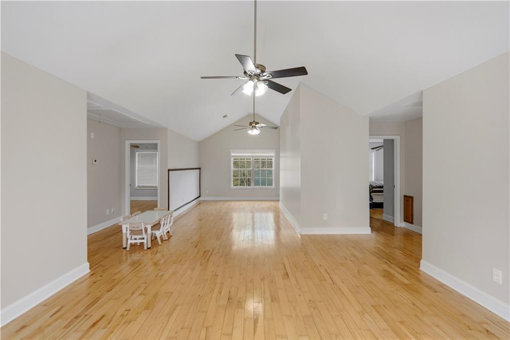 262 Iron Hill Road Taylorsville, GA 30178 - Photo 26 of 38 a view of empty room with wooden floor and fan