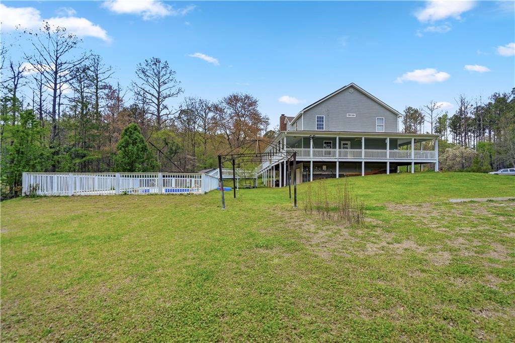 262 Iron Hill Road Taylorsville, GA 30178 - Photo 35 of 38 a view of a house with a yard