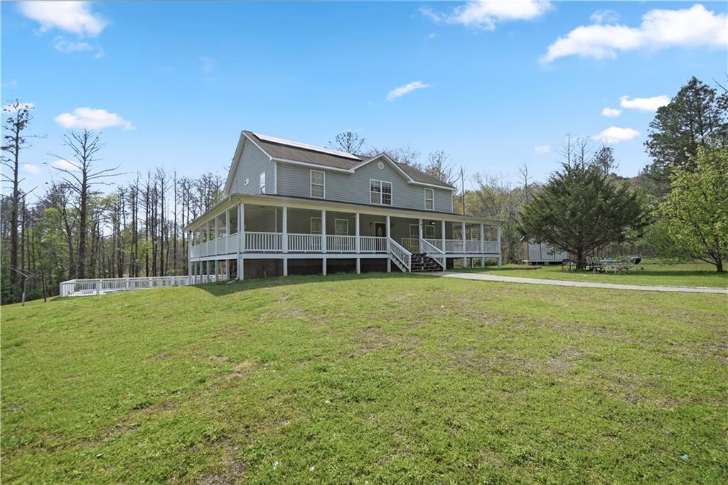 262 Iron Hill Road Taylorsville, GA 30178 - Photo 37 of 38 a house view with a garden space