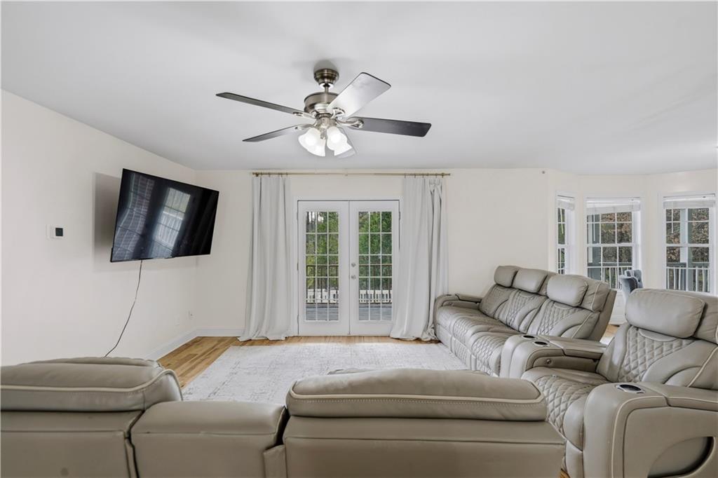 262 Iron Hill Road Taylorsville, GA 30178 - Photo 4 of 38 a living room with furniture and a flat screen tv