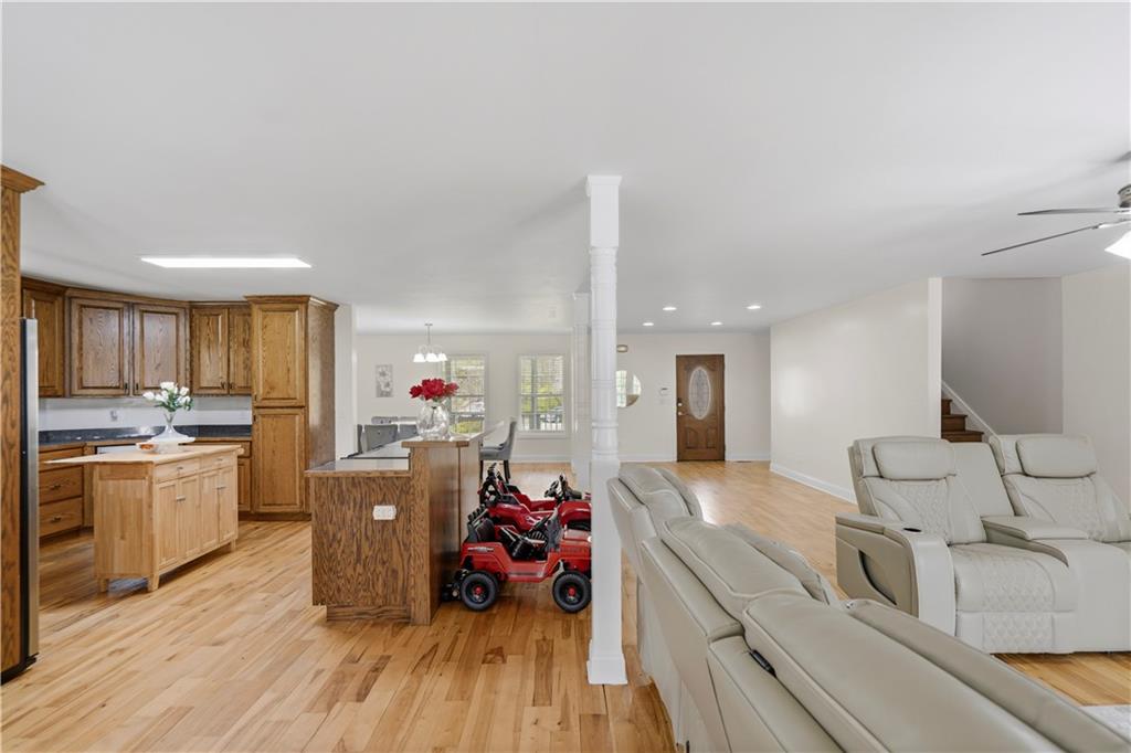 262 Iron Hill Road Taylorsville, GA 30178 - Photo 6 of 38 a very nice looking room with a large window wooden floor and stainless steel appliances