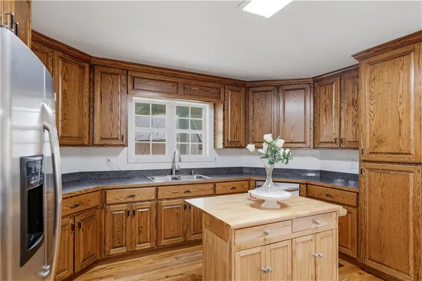a kitchen with a sink and cabinets