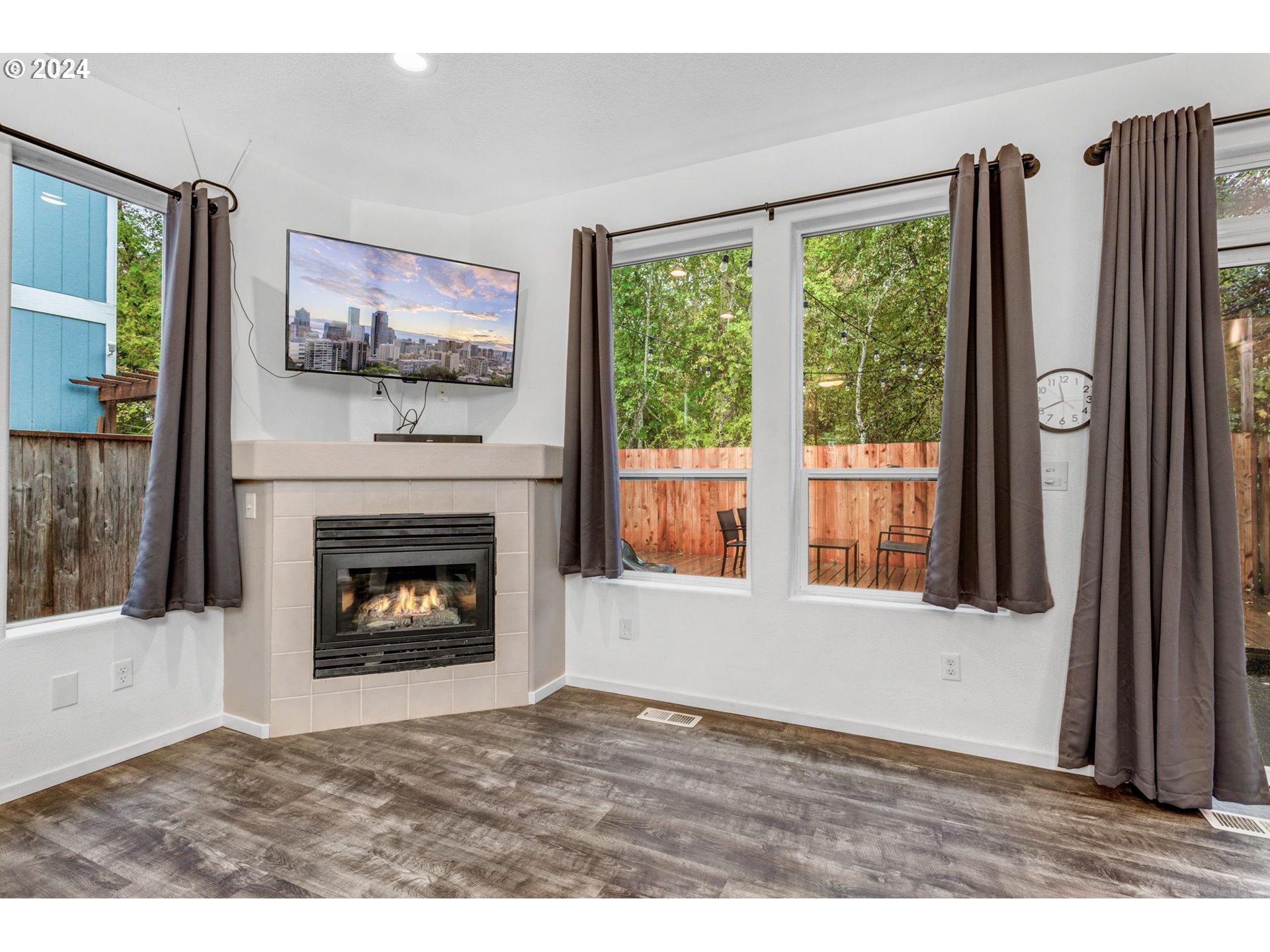 4083 Southwest 182nd Place Beaverton, OR 97078 - Photo 11 of 33 a view of a livingroom with furniture and a fireplace