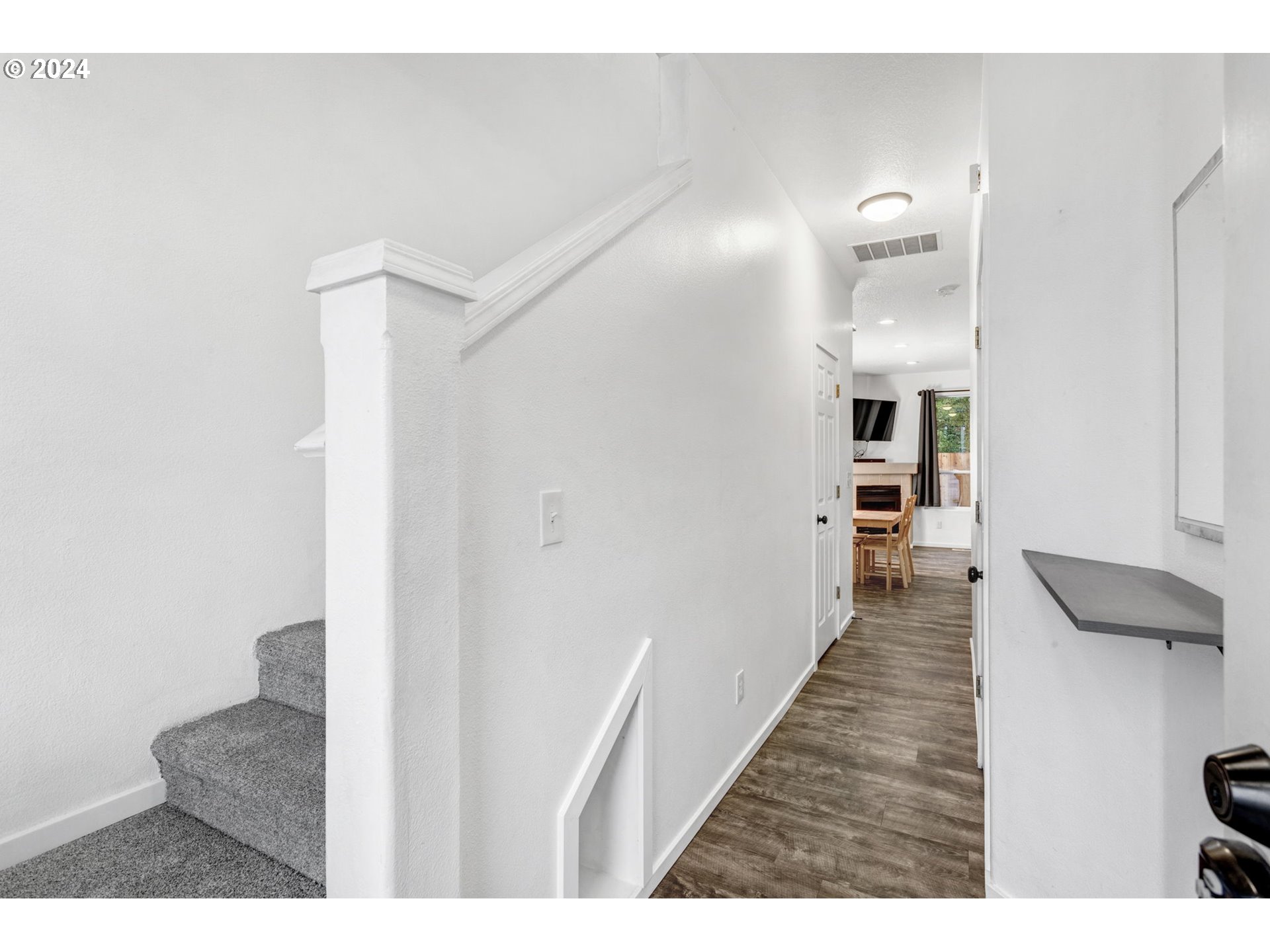 4083 Southwest 182nd Place Beaverton, OR 97078 - Photo 12 of 33 a view of a hallway with wooden floor