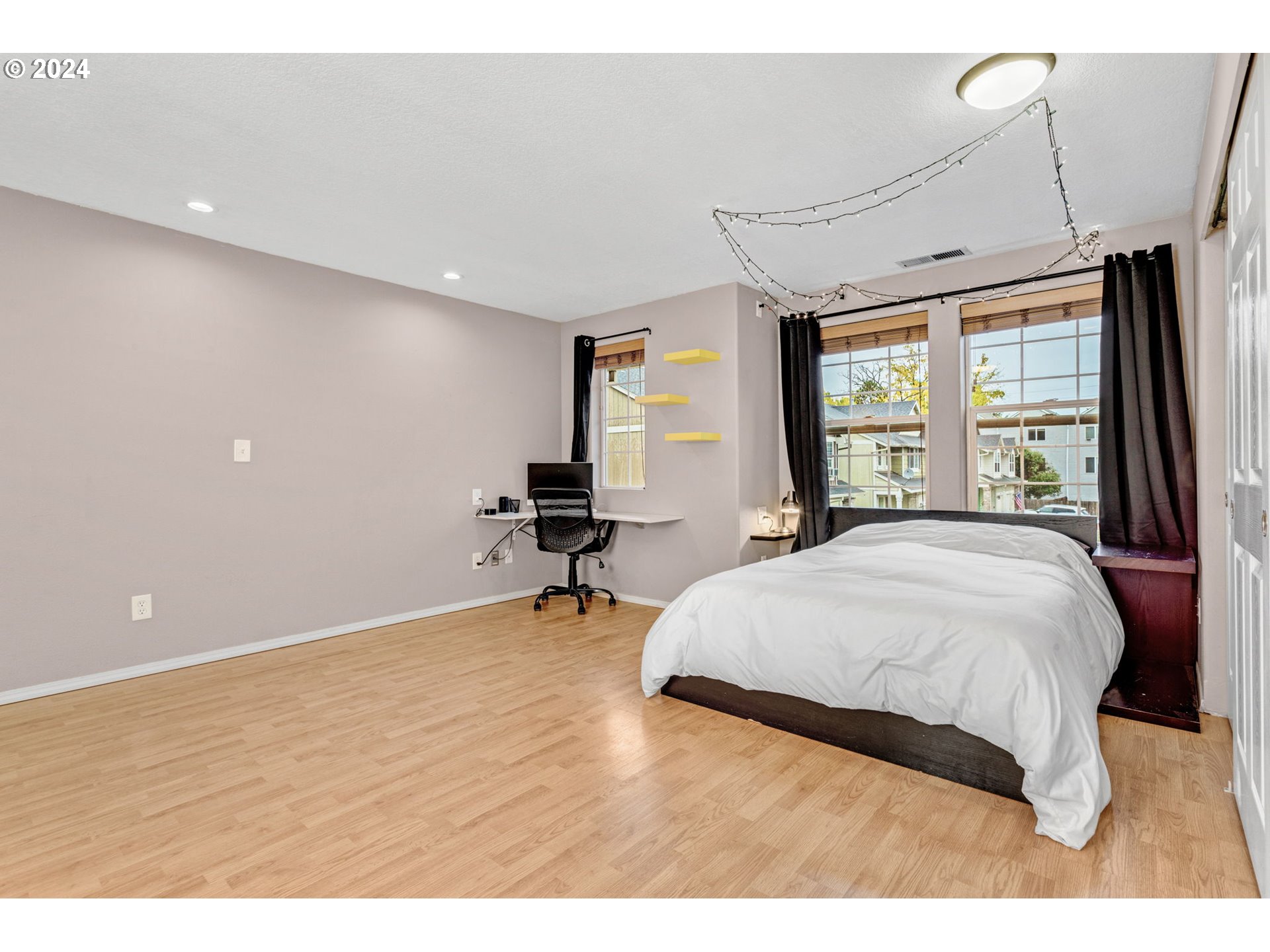 4083 Southwest 182nd Place Beaverton, OR 97078 - Photo 19 of 33 a bedroom with a bed and a window