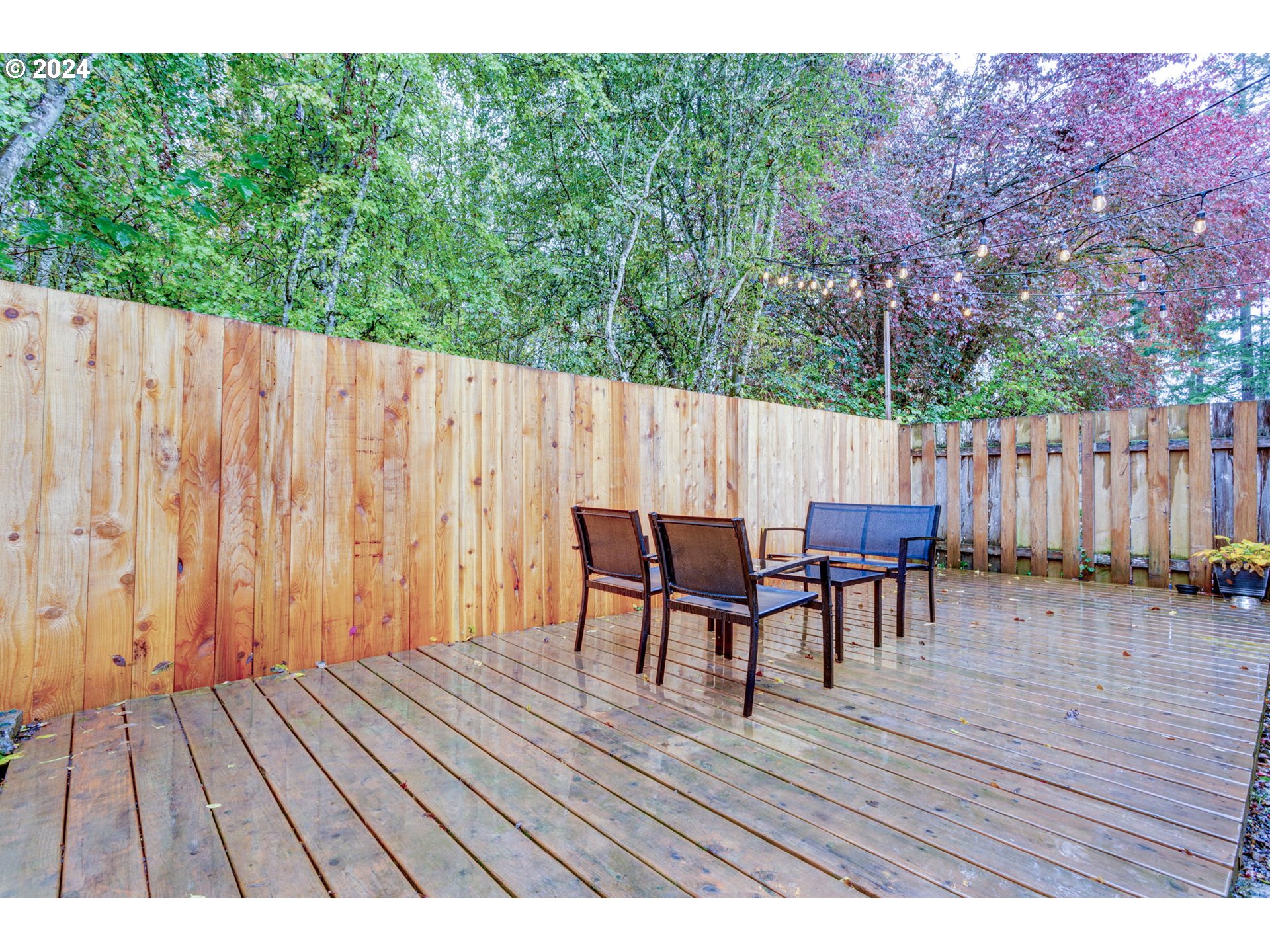 4083 Southwest 182nd Place Beaverton, OR 97078 - Photo 30 of 33 a view of outdoor space with a table and chairs