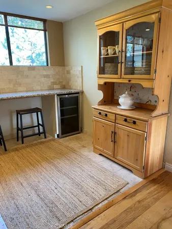 a kitchen with stainless steel appliances granite countertop a stove and a sink