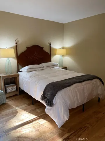 an aerial view of lake residential house and mountain view
