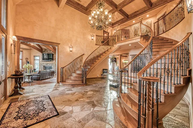 a kitchen with stainless steel appliances granite countertop a sink and cabinets