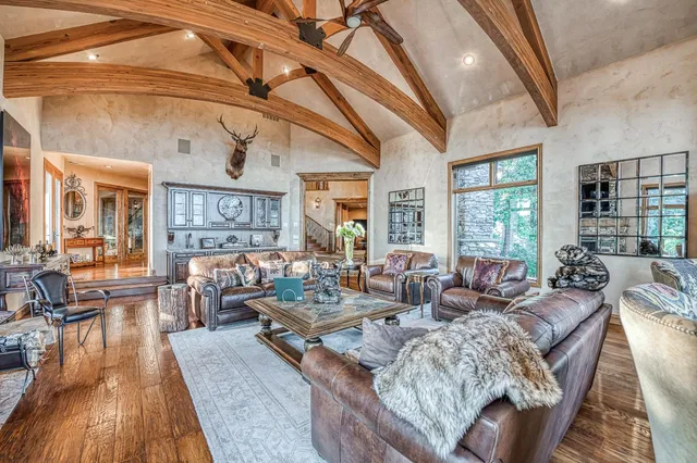 a bathroom with a sink a mirror and a shower