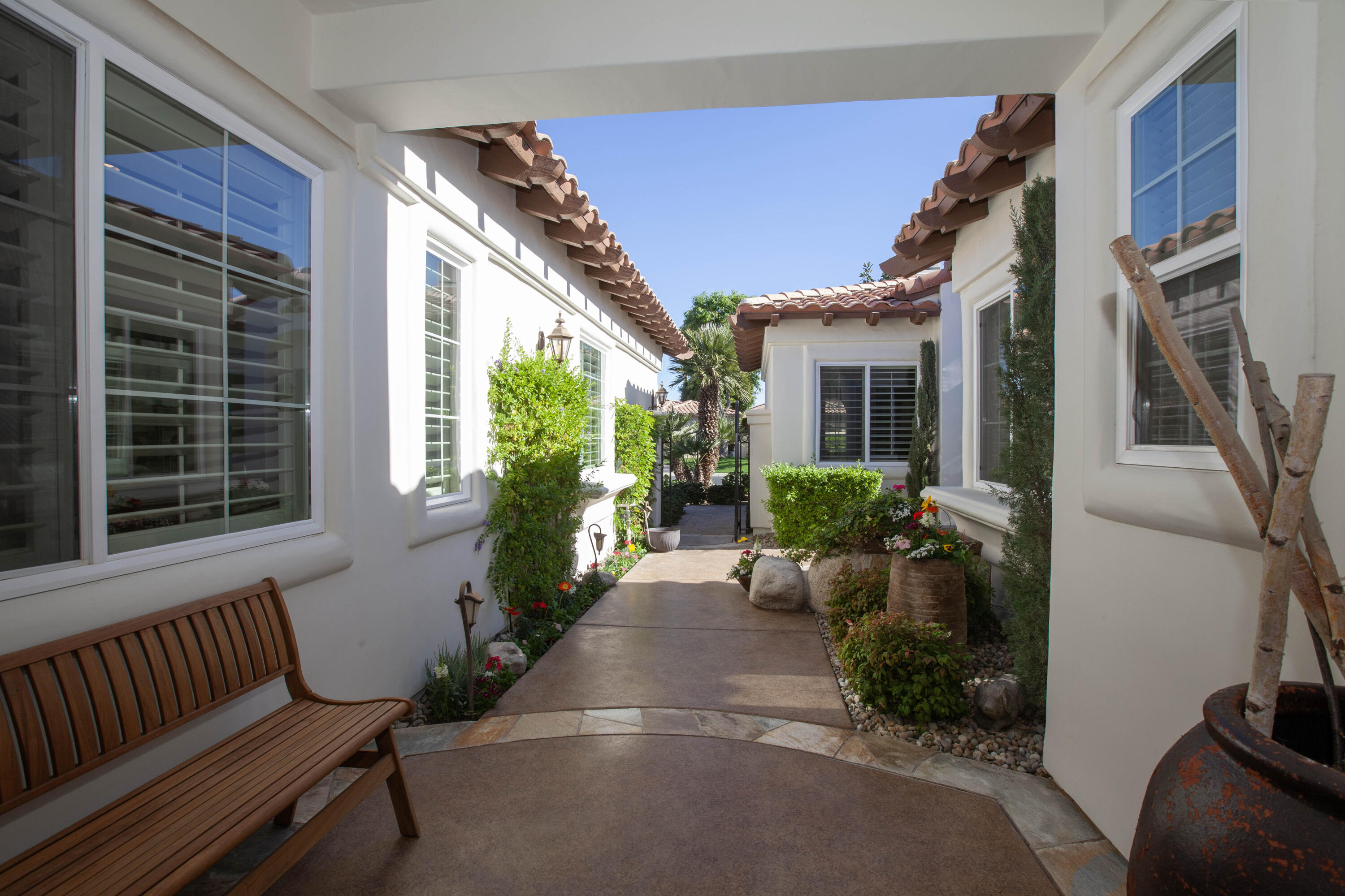 49487 Vía Conquistador La Quinta, CA 92253 - Photo 13 of 49 a view of house with outdoor space and porch