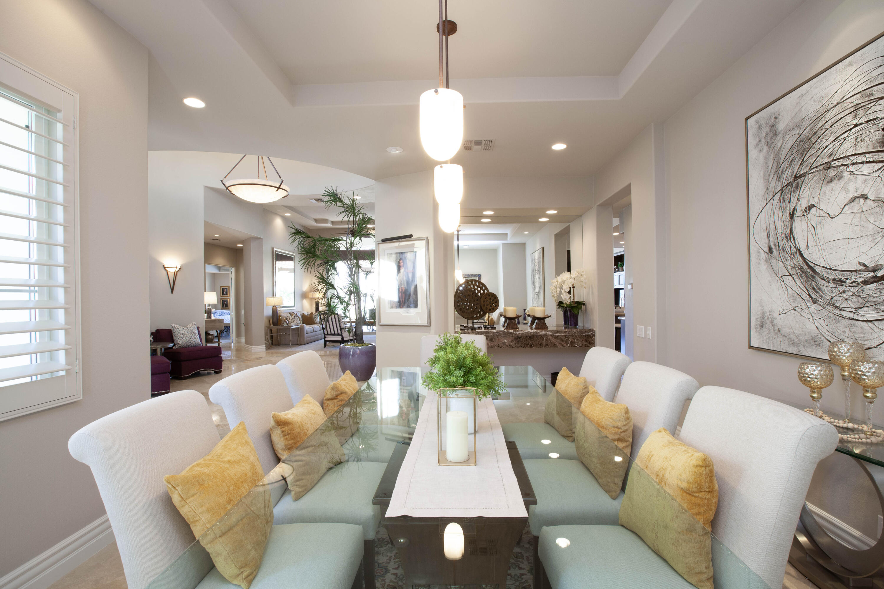 49487 Vía Conquistador La Quinta, CA 92253 - Photo 17 of 49 a living room with furniture and a chandelier