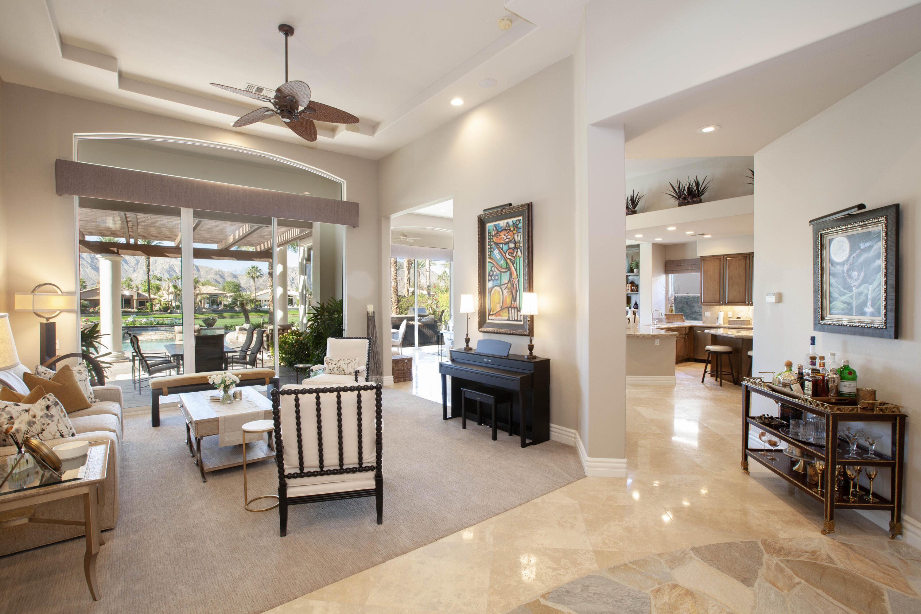 49487 Vía Conquistador La Quinta, CA 92253 - Photo 21 of 49 a living room with furniture and a large window