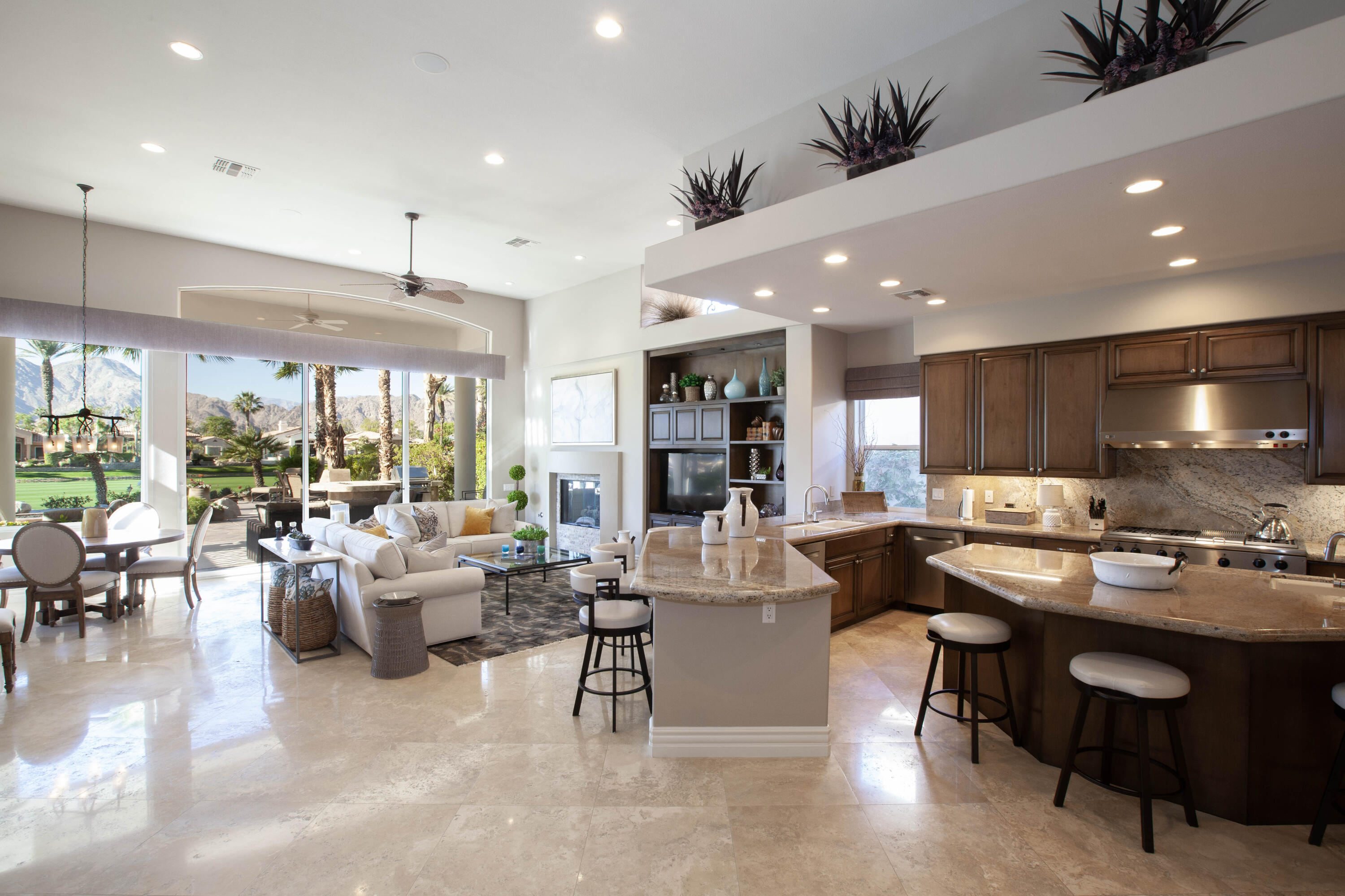 49487 Vía Conquistador La Quinta, CA 92253 - Photo 24 of 49 a living room with lots of furniture and painting