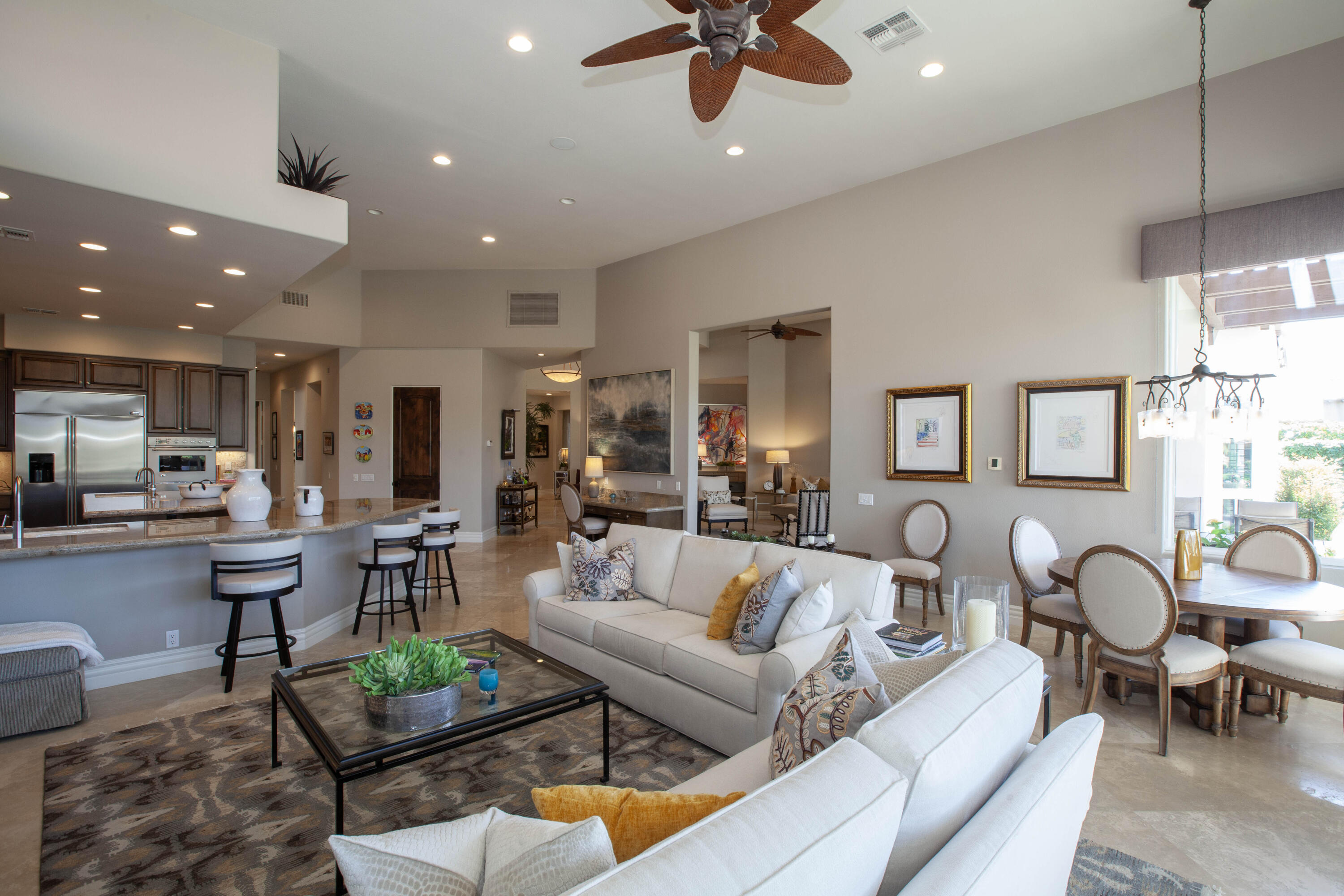 49487 Vía Conquistador La Quinta, CA 92253 - Photo 30 of 49 a living room with furniture and a view of kitchen