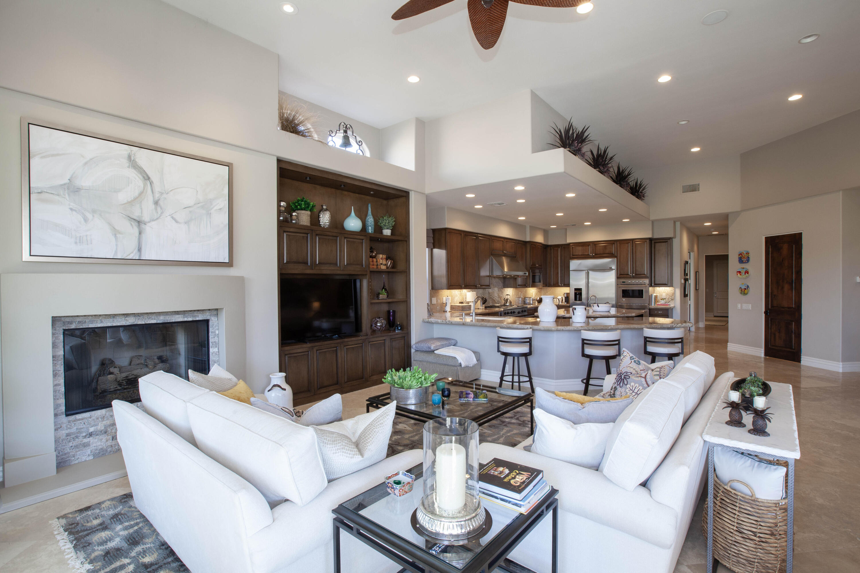 49487 Vía Conquistador La Quinta, CA 92253 - Photo 31 of 49 a living room with furniture and a fireplace