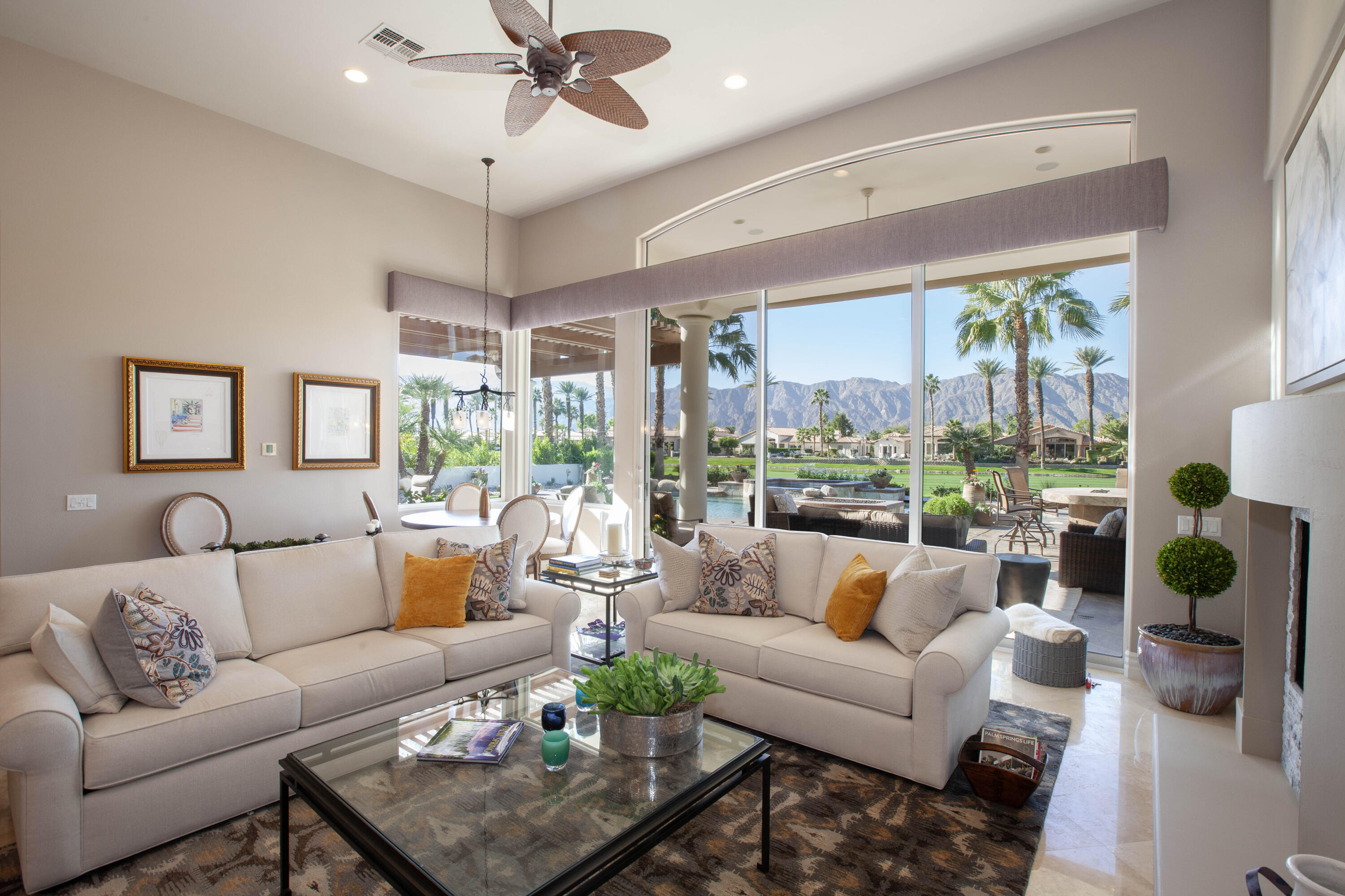 49487 Vía Conquistador La Quinta, CA 92253 - Photo 32 of 49 a living room with furniture and a large window