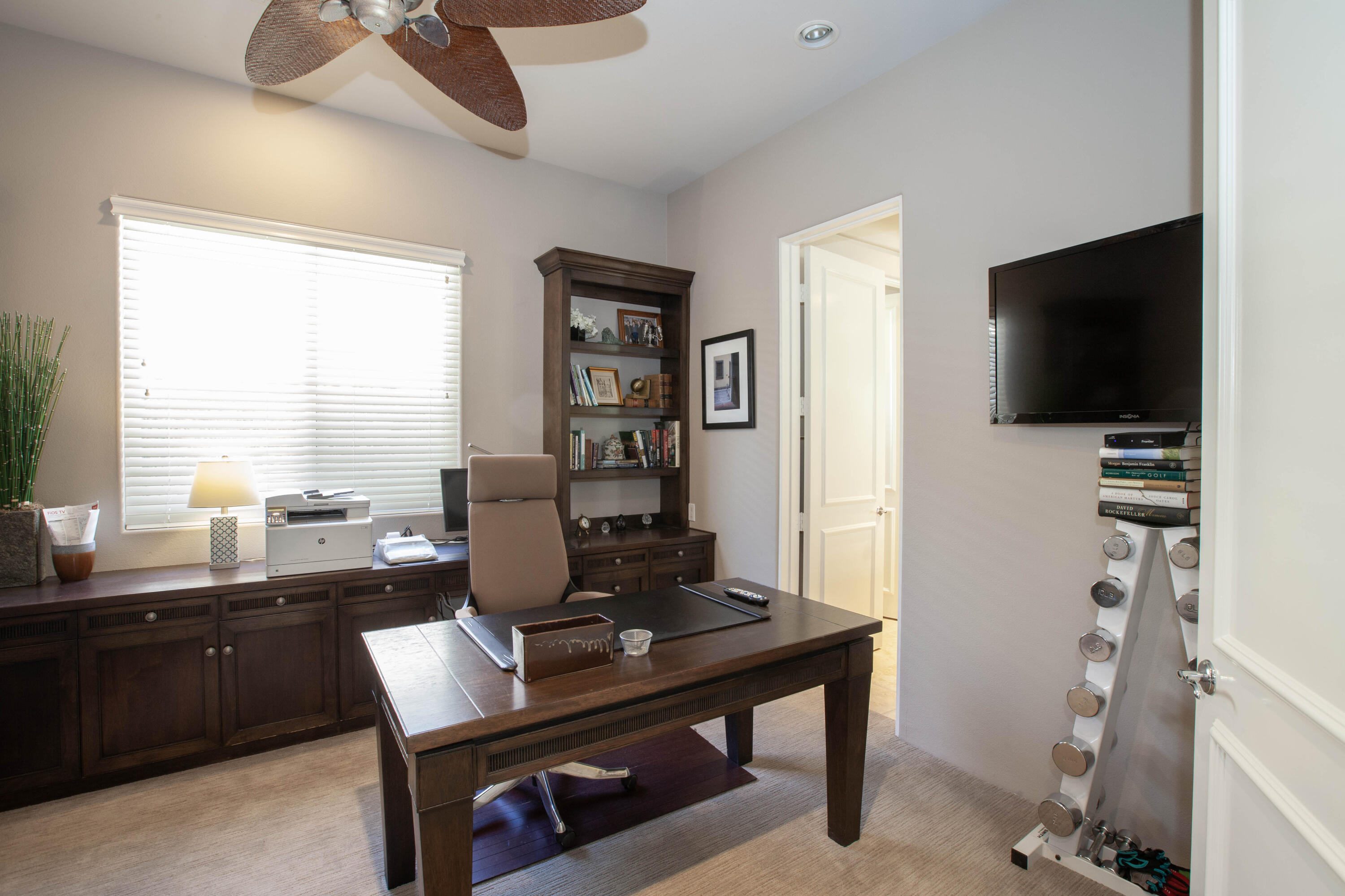 49487 Vía Conquistador La Quinta, CA 92253 - Photo 43 of 49 a view of a workspace with furniture and a window