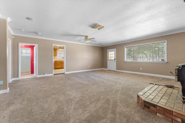 a bathroom with a granite countertop sink a vanity and a large mirror
