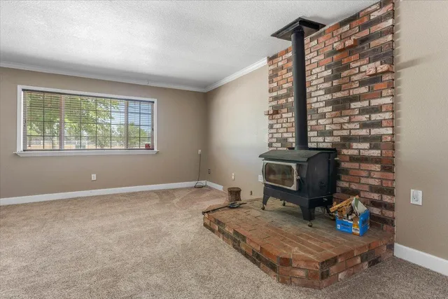 a kitchen with sink cabinets and window