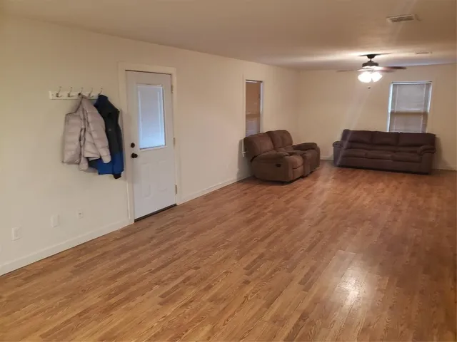 a view of a livingroom with a flat screen tv