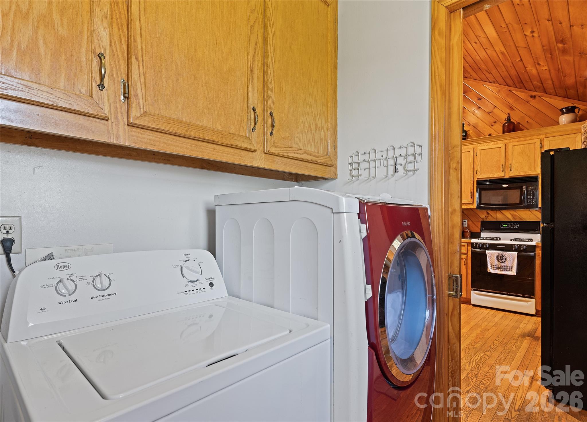 173 Blizzard Ridge Maggie Valley, NC 28751 - Photo 12 of 37 a utility room with dryer and washer