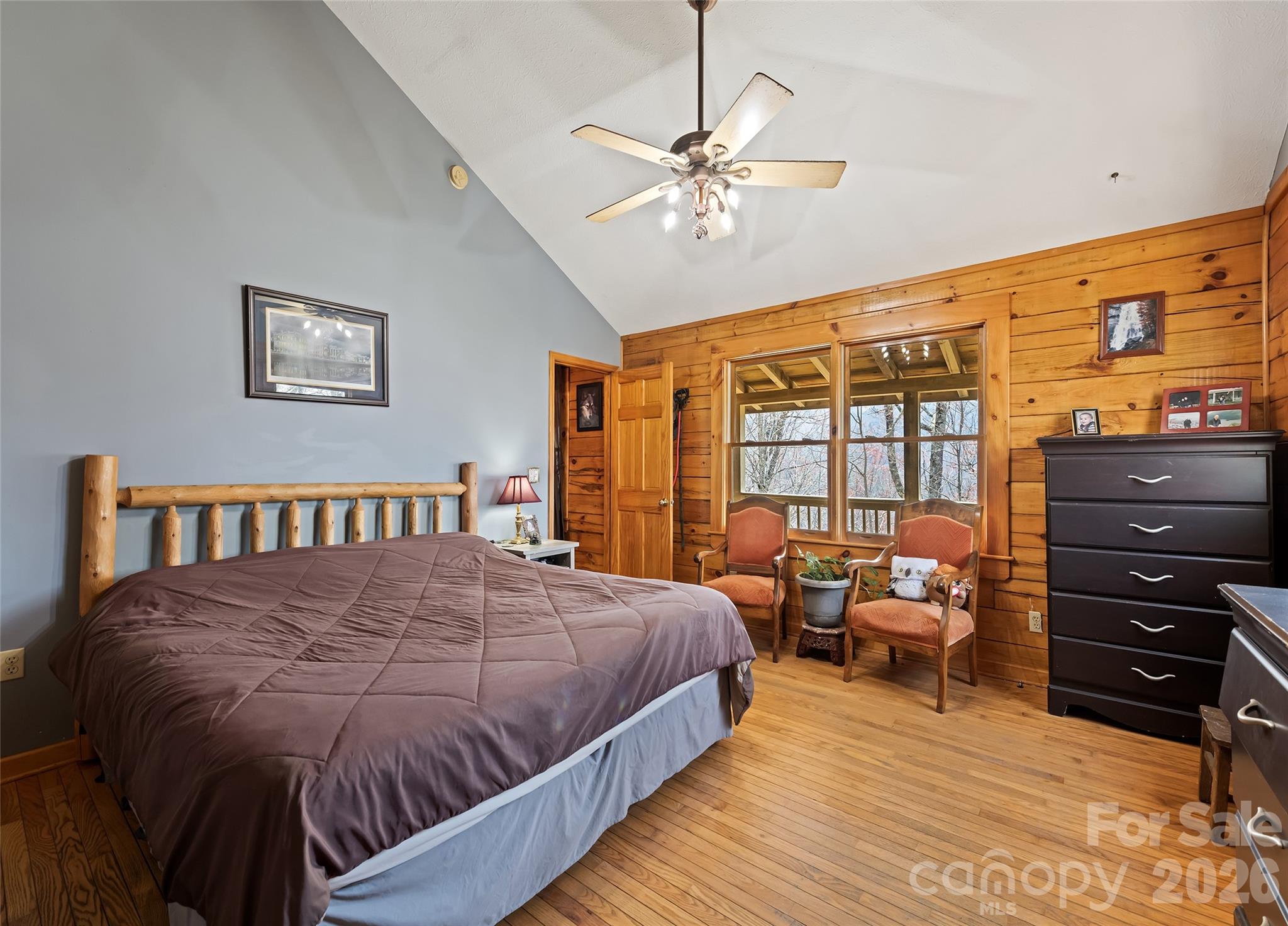 173 Blizzard Ridge Maggie Valley, NC 28751 - Photo 13 of 37 a large bedroom with a bed and wooden floor