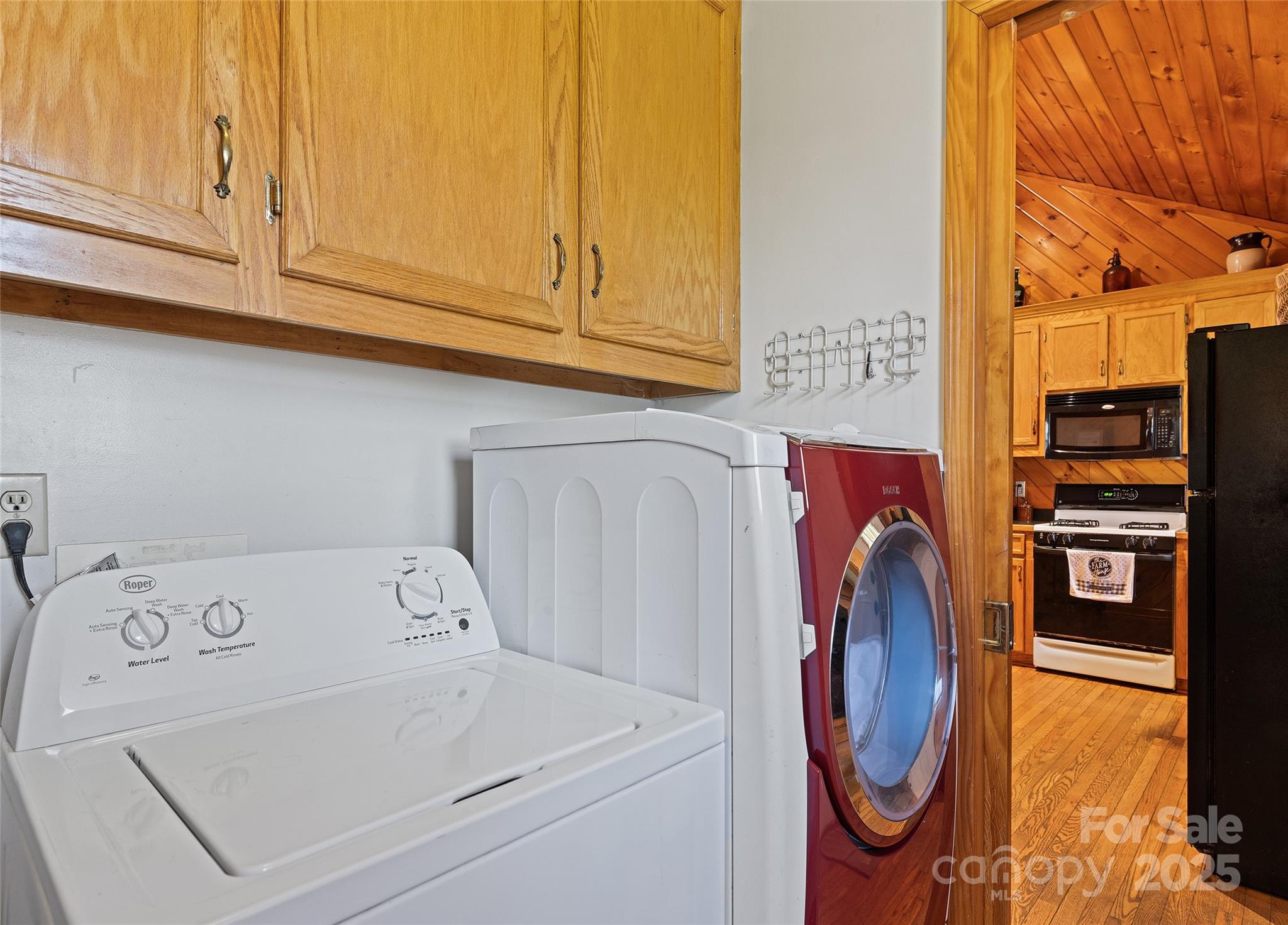 173 Blizzard Ridge Maggie Valley, NC 28751 - Photo 14 of 37 a utility room with dryer and washer