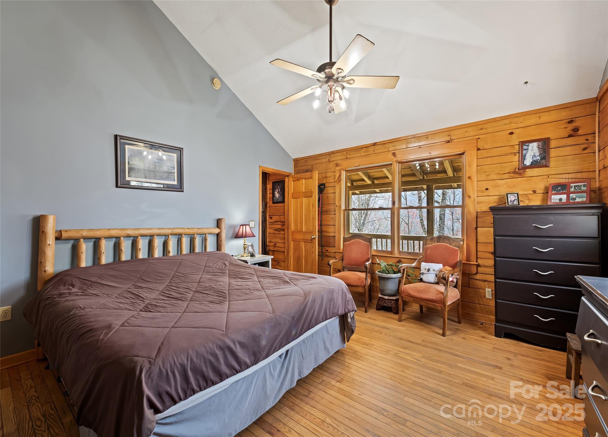 173 Blizzard Ridge Maggie Valley, NC 28751 - Photo 15 of 37 a large bedroom with a bed and wooden floor
