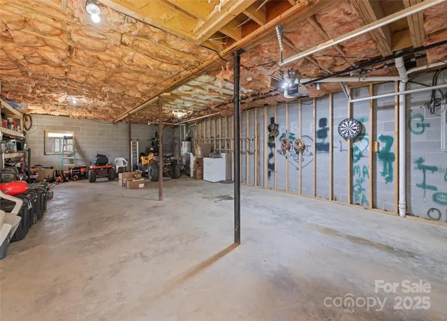 a view of a garage with rack and bicycle