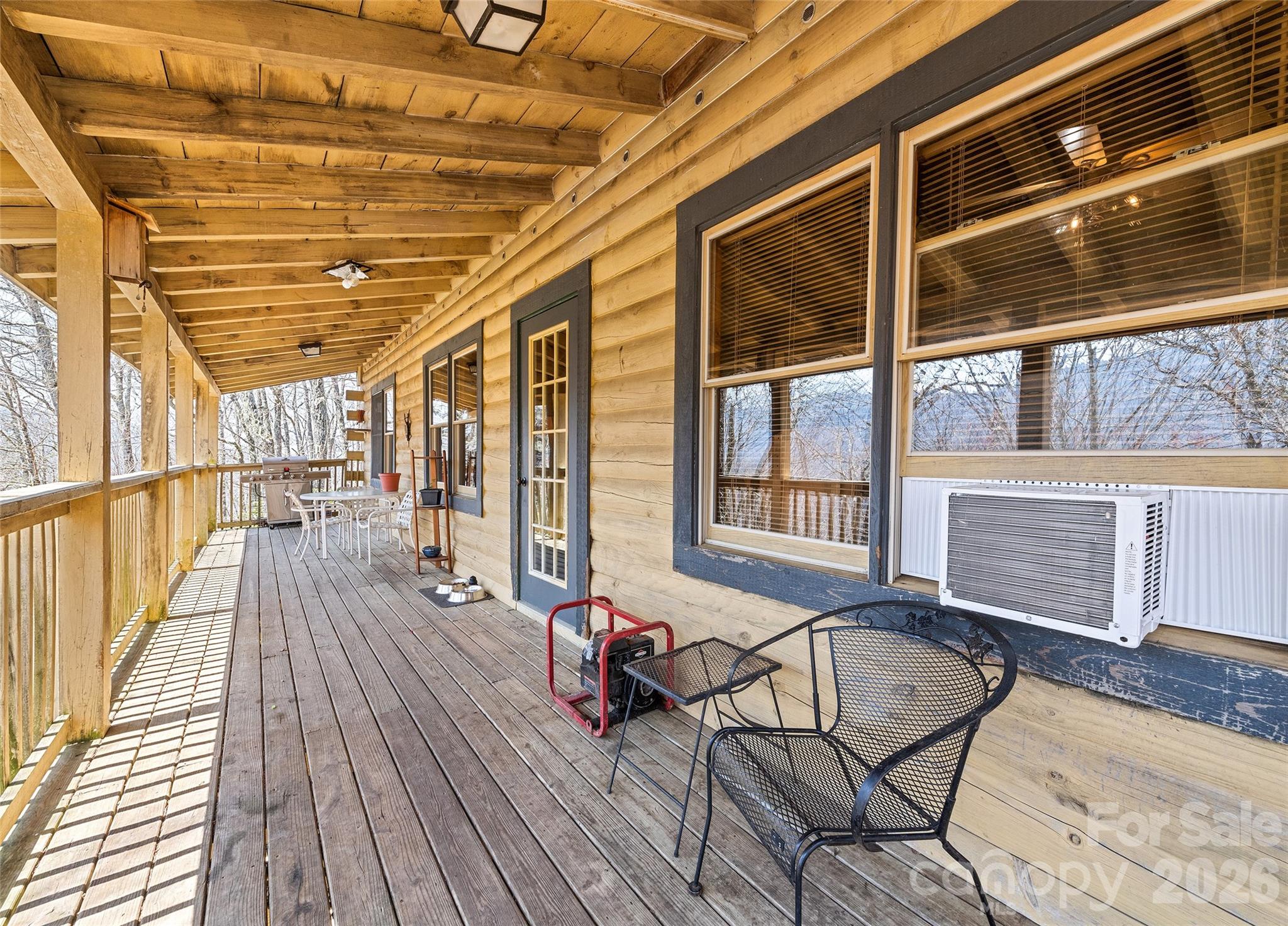 173 Blizzard Ridge Maggie Valley, NC 28751 - Photo 27 of 37 a view of a house with wooden deck