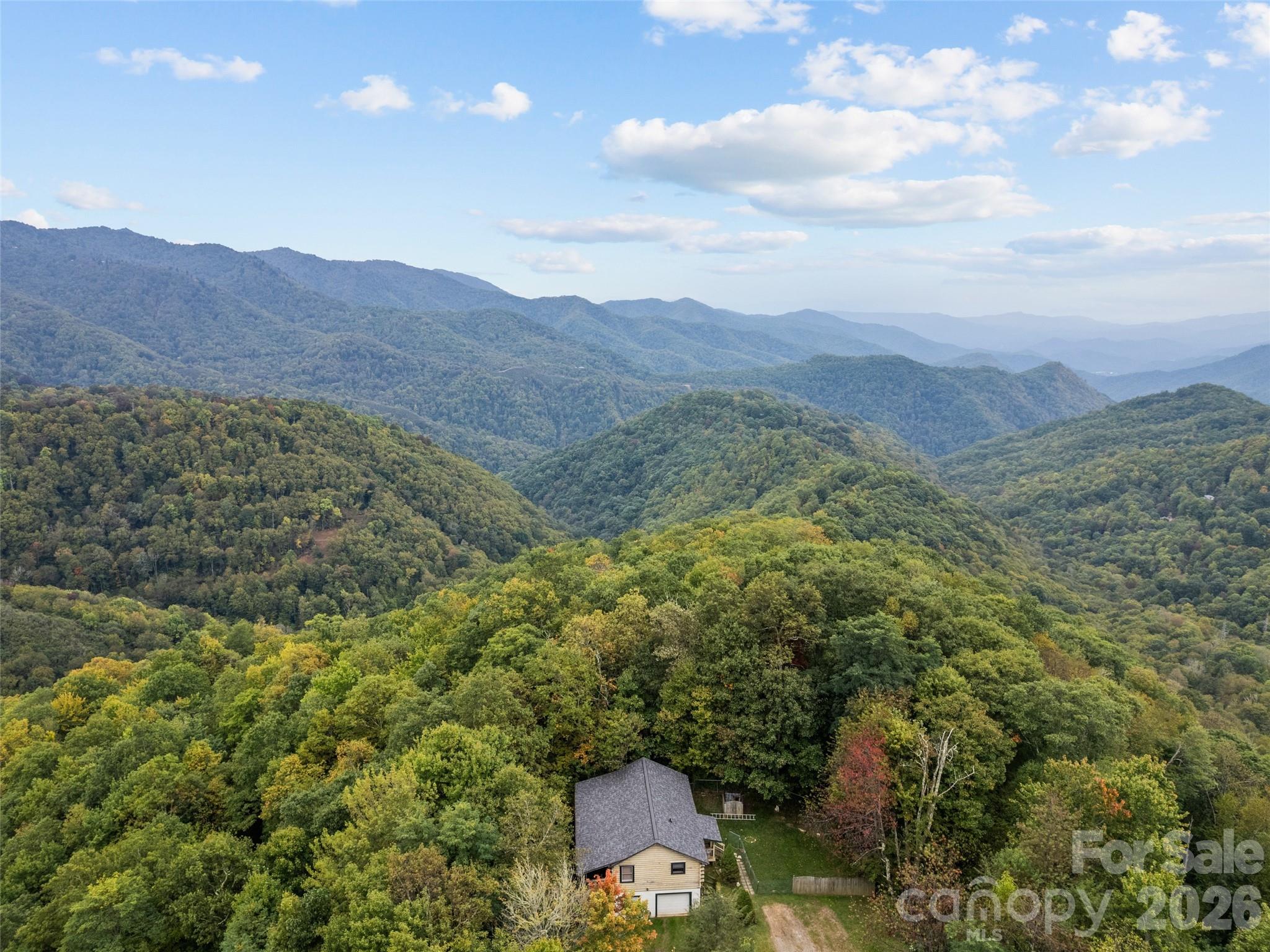 173 Blizzard Ridge Maggie Valley, NC 28751 - Photo 29 of 37 a view of a mountain with mountains in the background