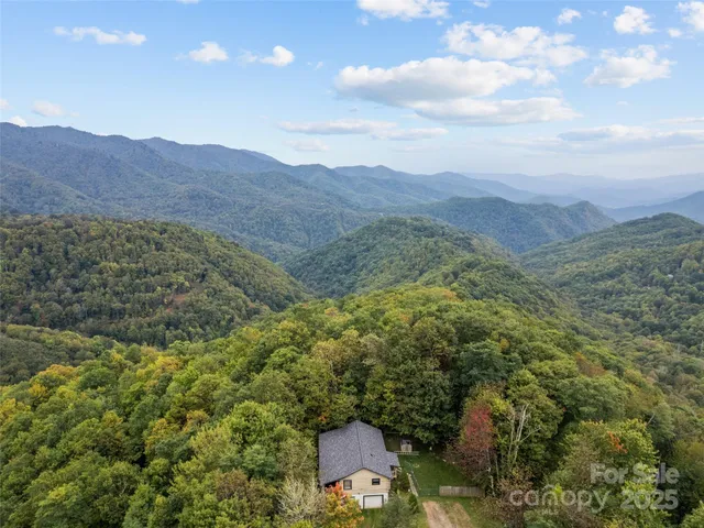 a view of a yard with an outdoor space and seating
