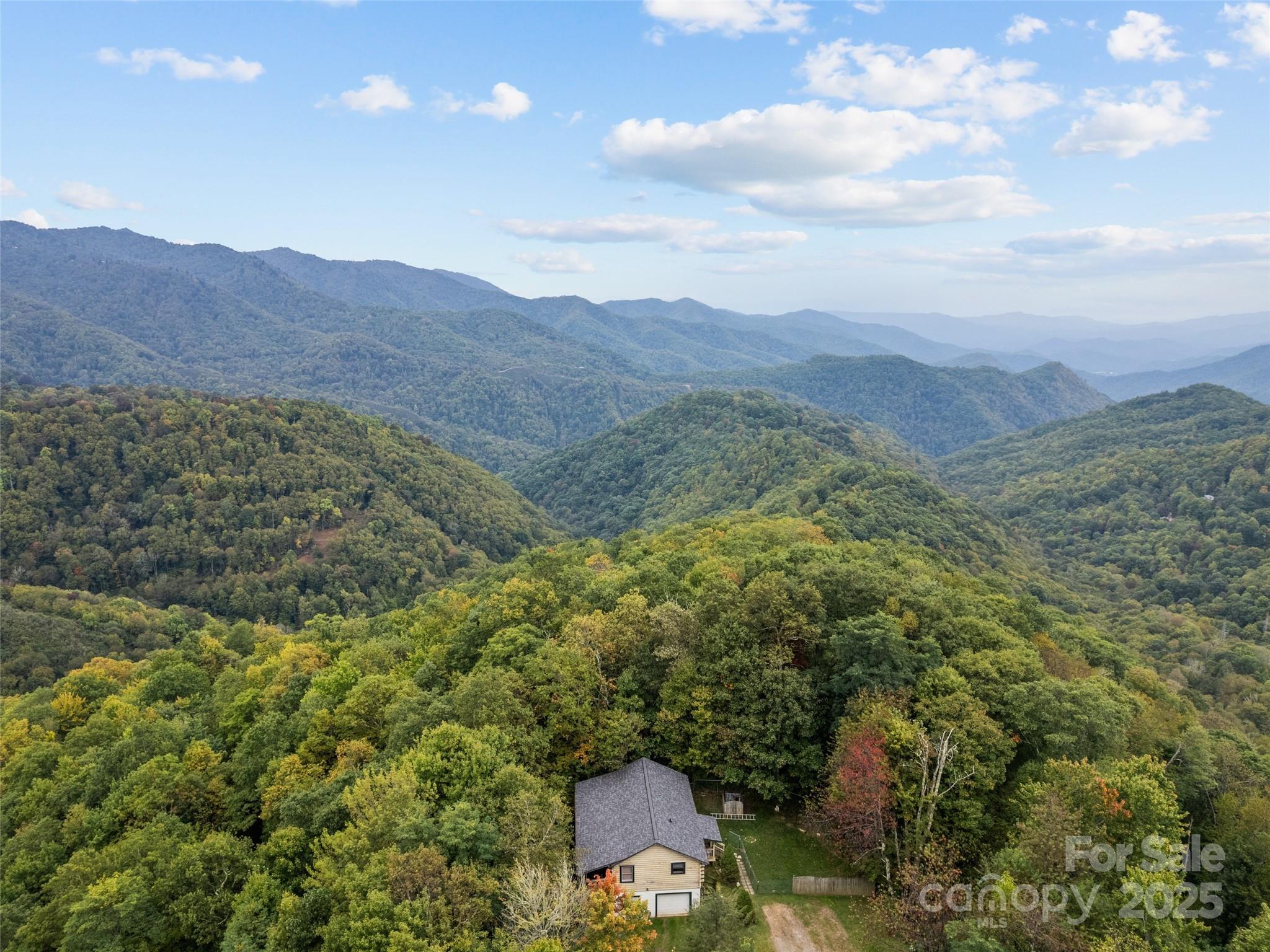173 Blizzard Ridge Maggie Valley, NC 28751 - Photo 31 of 37 a view of a mountain with mountains in the background